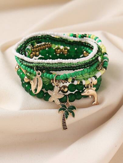 Set de 8 piezas de pulsera con colgantes de estrellas de mar, delfines y palmeras de vidrio verde en estilo bohemio, adecuado para uso diario y vacaciones, regalo