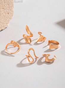 Juego de 4 anillos curvos con diseño sencillo y asimétrico con efecto hueco