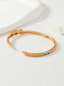 1 件迪拜风格金色邪眼铜质袖口手链，带蓝色吊坠设计，女款