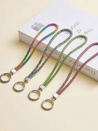 1 件全水钻手机挂绳，配有水钻吊坠、钥匙扣和钥匙圈手机带