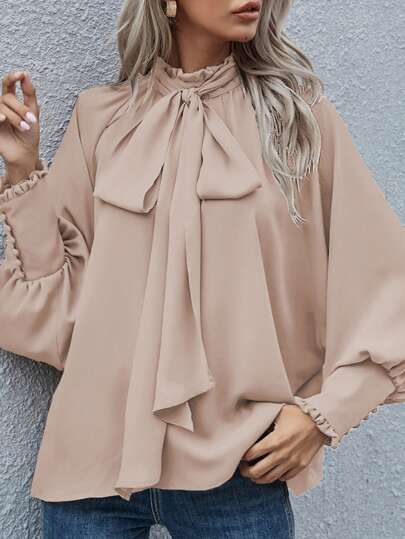 Blusa con maniche lunghe, morbida, color tinta unita, con polsini con fiocco, stile Europa e America