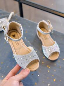 1 par de sandalias de princesa con diamantes de imitación y brillo para niñas, zapatos de baile de suela blanda con correa para el tobillo y punta abierta para niños