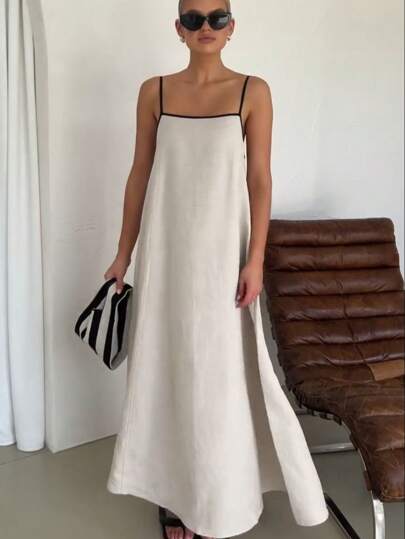 MODA MO, REF H955 Vestido longo feminino, estilo suspensório, alça ajustável, algodão e linho, contraste de cor, vestido casual, visual elegante, moda feminina, saia longa, vestido com alças, ajuste nas alças, look moderno, moda confortável, estilo versátil, vestido de verão, caimento fluido, visual leve, vestido com personalidade, vestido feminino de qualidade, toque suave, design moderno, peça prática, roupa de dia a dia, visual despojado, vestido com caimento perfeito, tecido natural, elegância simples.