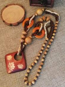 1 Stück Boho Holzperlen Quadratischer geschnitzter Blattanhänger Halskette, exquisite vintage handgefertigte gewebte Kokosnuss Rundperlen lange Ketten Halskette, luxuriöser Schmuck geeignet für elegante Damen, Mädchen, Party, Strand, Urlaub, Zusammenkünfte