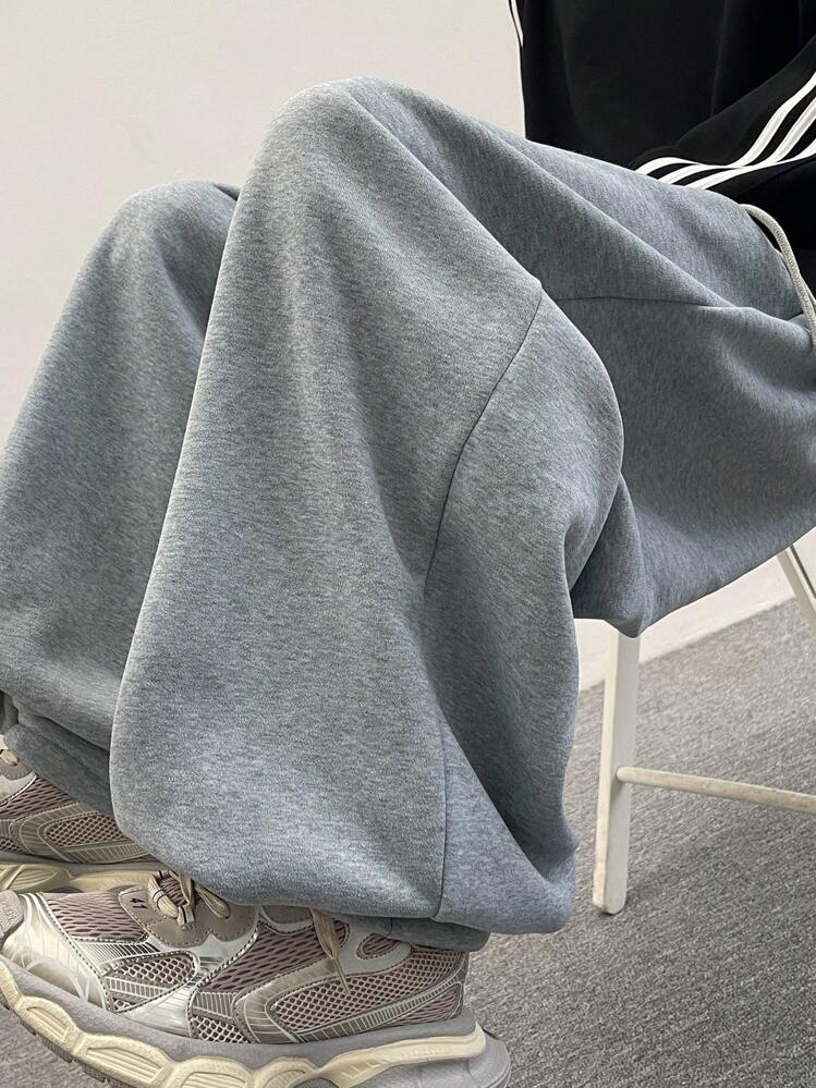 Pantalones casuales sueltos con cordón en la cintura, pantalones largos de estilo callejero para hombres - Gris Claro - Añade 5