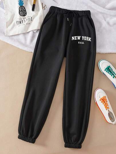 Pantalones deportivos con cordón ajustable en la cintura y estampado de letras de dibujos animados, confeccionados en un tejido ligero, transpirable y fresco, perfectos para el verano.