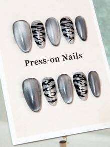 10 Stück handgemachte kurze ovale Kunstnägel, schwarz, Katzenaugen-Zebramuster Vollabdeckung wiederverwendbare Aufklebe-Nägel für Frauen, Reisen, Partys, Dates, Büroalltag, Festivitäten, Nagelbedarf