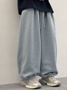 男士抽绳腰宽松休闲裤，街头风长裤