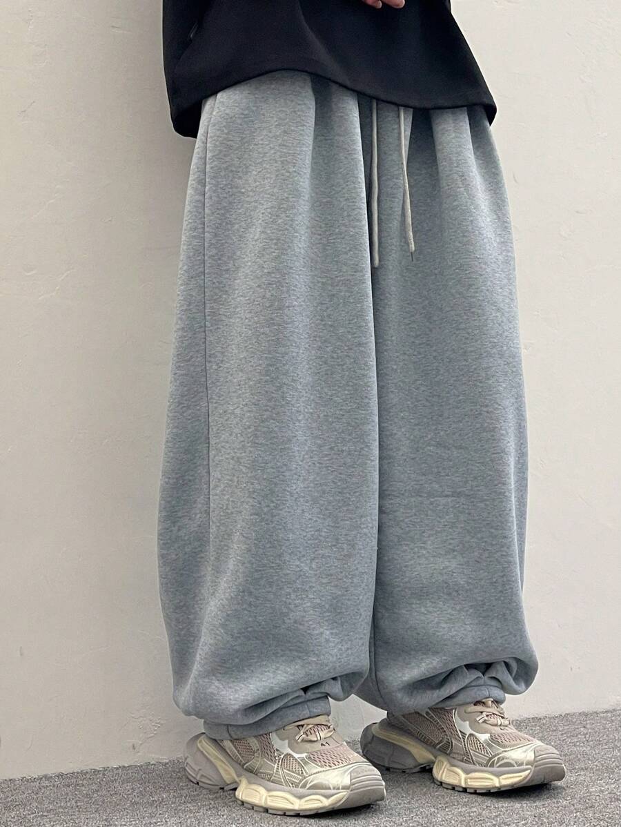 男士抽绳腰宽松休闲裤，街头风长裤