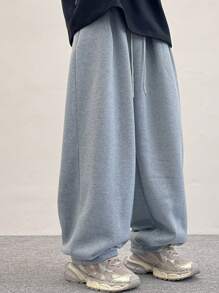 男士抽绳腰宽松休闲裤，街头风长裤