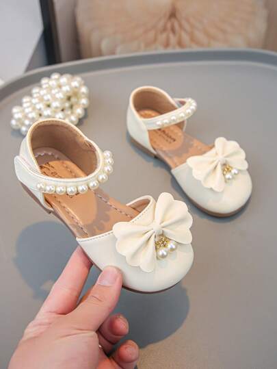 Sandalias planas para exterior con decoración de perla de color liso minimalista para niñas