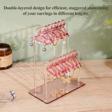 Los clips para pendientes de acrílico tienen un diseño único de doble capa, con pequeños ganchos para colgar que ofrecen un amplio espacio de almacenamiento para 48 pares de pendientes. Ideal para exhibir en espejos, tocadores del hogar y mostradores minoristas. Organizador, soporte y bandeja de joyas.