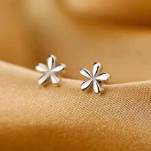 1 par de aretes minimalistas con diseño floral para mujer, moda