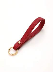 1 pièce Nouveau porte-clés en cuir de couleur unie, sangle de poignet, accessoire de sac à bandoulière, chaîne de clé de voiture à la mode, accessoire de voiture détachable, breloques scolaires