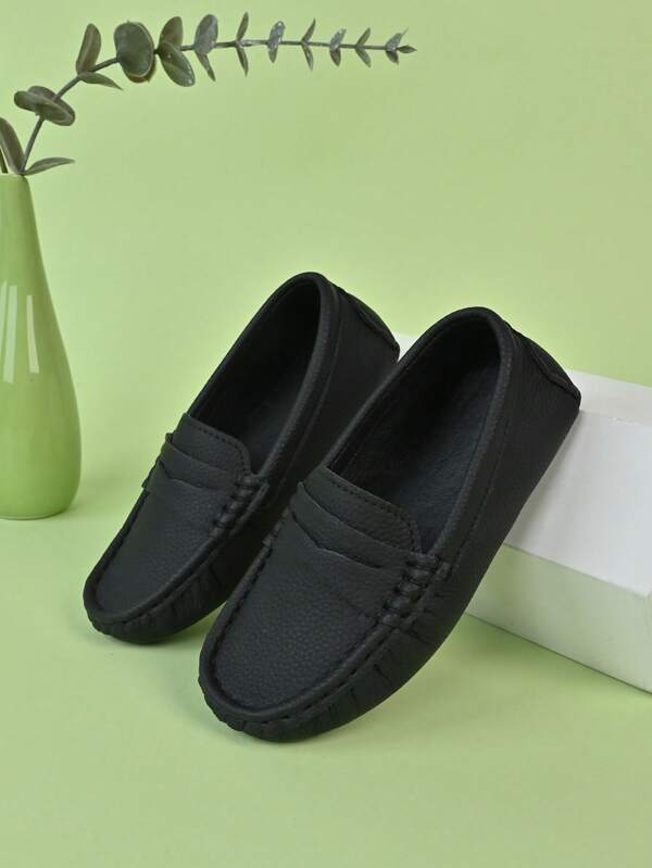 1 par de mocasines negros suaves y sin cordones para niños, aptos para primavera y otoño