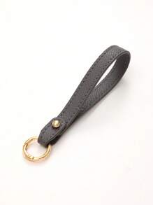 1 pièce Nouveau porte-clés en cuir de couleur unie, sangle de poignet, accessoire de sac à bandoulière, chaîne de clé de voiture à la mode, accessoire de voiture détachable, breloques scolaires