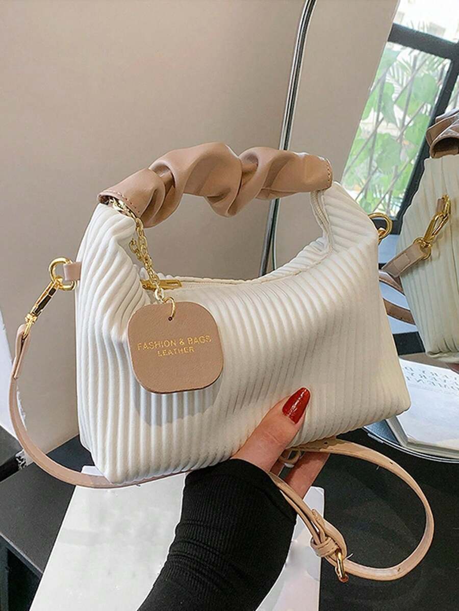 Nowa modna prosta uniwersalna plisowana tkana torebka PU z blokowaniem kolorów na ramię, jednokolorowa chmurka z wisiorkiem, swobodna, elegancka