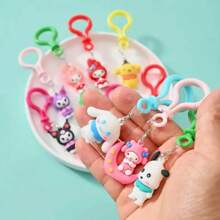 Sanrio Conjunto de 32 piezas de Caja Misteriosa - Muñecos y Encantos para Teléfono de Hello Kitty, Cinnamoroll y Amigos - Perfecto para Fiestas de Cumpleaños, Decoraciones Navideñas y Regalos Pequeños