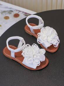 Un par de sandalias para niñas Nuevos zapatos de princesa con lazo, diseño de banda elástica, suela blanda, zapatos casuales de playa para niñas en verano.