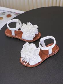 Un par de sandalias para niñas Nuevos zapatos de princesa con lazo, diseño de banda elástica, suela blanda, zapatos casuales de playa para niñas en verano.