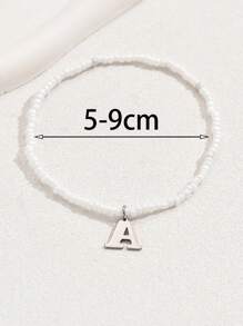 1 pieza Elegante tobillera de acero inoxidable con cuentas de arroz y colgante con letra de 26 para dama, estilo de resort de playa