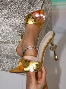 Sandalias de tacón alto con punta afilada en dorado para mujer