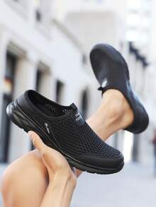 زوج من أحذية رياضية كاجوال قابلة للانزلاق مصنوعة من شبكة تنفس للرجال، خفيفة الوزن ومريحة (المقاس يميل للصغر، يرجى طلب مقاس أكبر بمقدار مقاس واحد) - الأسود - مشاهدة 2