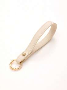 1 pièce Nouveau porte-clés en cuir de couleur unie, sangle de poignet, accessoire de sac à bandoulière, chaîne de clé de voiture à la mode, accessoire de voiture détachable, breloques scolaires