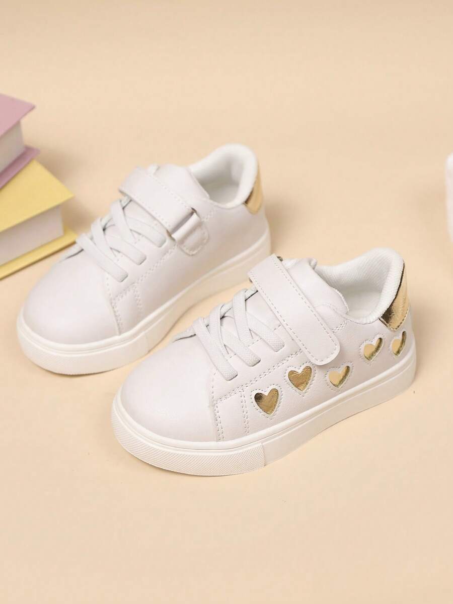 1 par de zapatillas casuales cómodas y ligeras con diseño de corazón hueco, adecuadas para estudiantes para actividades deportivas y salidas diarias, para todas las estaciones