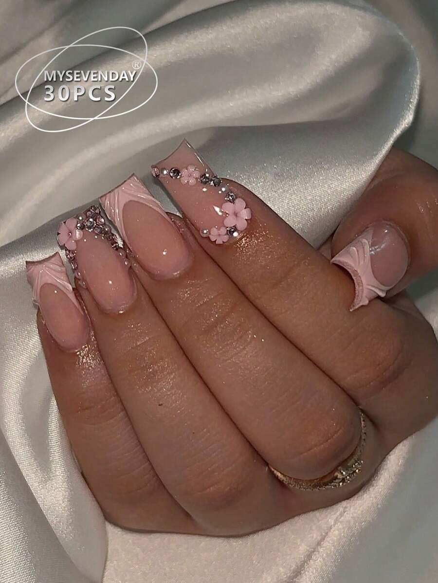 Bộ 24 miếng dán móng tay giả ép hình quan tài cỡ vừa của Press On Nails, với viền kim cương lấp lánh và họa tiết hoa Pháp ngọt ngào, mát mẻ dành cho nữ. Đầu ngón tay mới và thời trang, kèm theo 1 miếng keo dán và 1 miếng băng dán. Thích hợp cho các buổi tiệc tùng, khiêu vũ, trang phục thường ngày, phụ kiện làm móng có thể tháo rời và tái sử dụng.