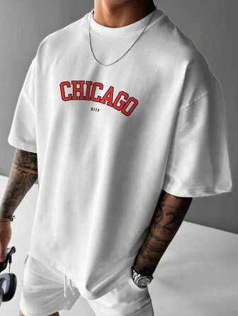 男士宽松时尚小字母印花白色短袖 T 恤，适合春夏季跑步、健身和休闲穿着