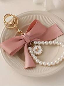 1 件迷人粉色蝴蝶结和人造珍珠串珠钥匙扣腕带 - 涤纶，蝴蝶灵感设计，适合钥匙、钱包、手机 - 时尚女士配饰汽车配饰包饰学校人造珍珠可爱哥特 Y2k 圣诞礼物创意包饰挂绳带身份证夹汽车配饰包饰 - 粉色 - 查看 3