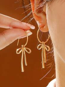 2 stuks eenvoudige gouden strik hanger oorbellen, elegante stijl sieraden voor meisjes