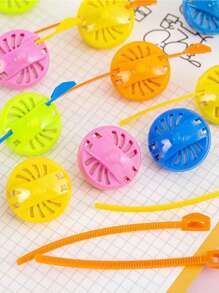 1/10/16 piezas Mini trompo con cordón de jalado, clásico giro de cordón de cremallera retro, regalo festivo, adecuado para recompensas en el aula, obsequios para fiestas (color aleatorio)