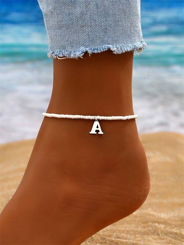 1 pieza Elegante tobillera de acero inoxidable con cuentas de arroz y colgante con letra de 26 para dama, estilo de resort de playa