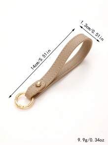 1 pièce Nouveau porte-clés en cuir de couleur unie, sangle de poignet, accessoire de sac à bandoulière, chaîne de clé de voiture à la mode, accessoire de voiture détachable, breloques scolaires