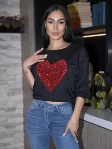 Carolina Barros Sudadera de hombros caídos con patrón de corazón de lentejuelas, color negro