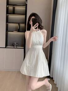 RUIWY Chiffon Apricot Color Waisted Slimming Comfortable Breathable Elegant Fashion Lady Dress, Sleeveless Short Design With Big Bow Back, Suitable For Spring And Summer