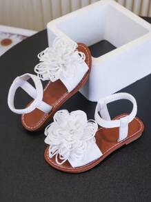 Un par de sandalias para niñas Nuevos zapatos de princesa con lazo, diseño de banda elástica, suela blanda, zapatos casuales de playa para niñas en verano.