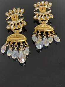 1 paire de boucles d'oreilles vintage punks à franges et forme d'yeux avec des strass, boucles d'oreilles œil flashy chic français convenant à un style personnel