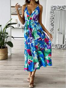 Vestido camisero con volantes en el dobladillo con estampado tropical
