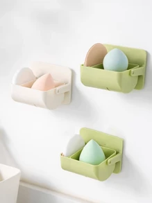 Caja de almacenamiento de motas, soporte giratorio montado en la pared para dividir las esponjas de maquillaje, cojín de aire no perforado, estante transpirable para huevos de belleza