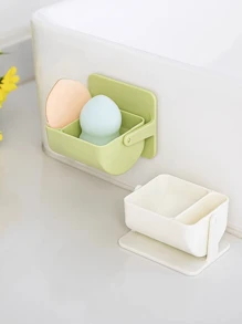 Caja de almacenamiento de motas, soporte giratorio montado en la pared para dividir las esponjas de maquillaje, cojín de aire no perforado, estante transpirable para huevos de belleza