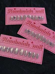 10 Stück Katzenauge Nägel mit schwarzen Punkten, Aufklebe-Nägel mit Schleifendekor, Glitzer-Fake-Nägel in kurzer Sargform, Maniküre-Set inklusive 1 Stück Blatt Klebestreifen & 1 Stück Mini-Feile, perfekt für den täglichen Gebrauch, Nagelbedarf