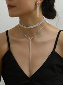 1 条双层钻石镶嵌 Y 形项链 + 1 对华丽钻石镶嵌晚宴耳环