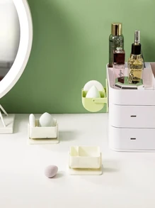Caja de almacenamiento de motas, soporte giratorio montado en la pared para dividir las esponjas de maquillaje, cojín de aire no perforado, estante transpirable para huevos de belleza