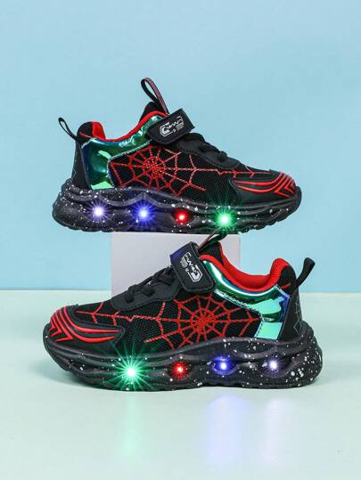 1 par mode LED Glödande Spider Web Design Andningssportskor, lämpliga för pojkar och flickor - Casual, stötdämpande, halkfria löpar- och promenadskor utomhus för alla årstider