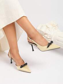 Zapatos de tacón alto con puntera abierta, combinación de dos colores, lazo incrustado, correa trasera, tacón alto delgado, adecuados para el trabajo y fiestas