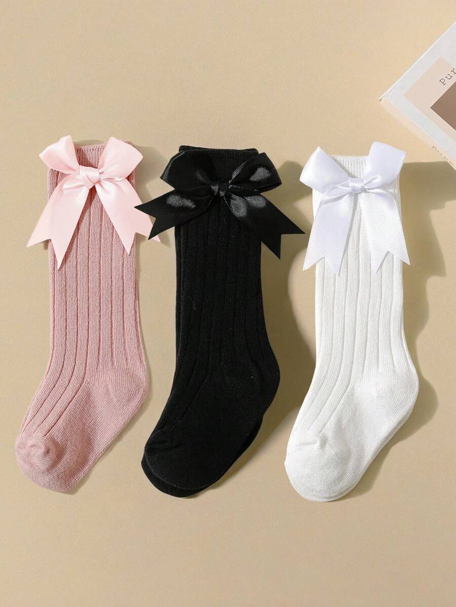 3 双女婴甜美蝴蝶结装饰罗纹高筒袜