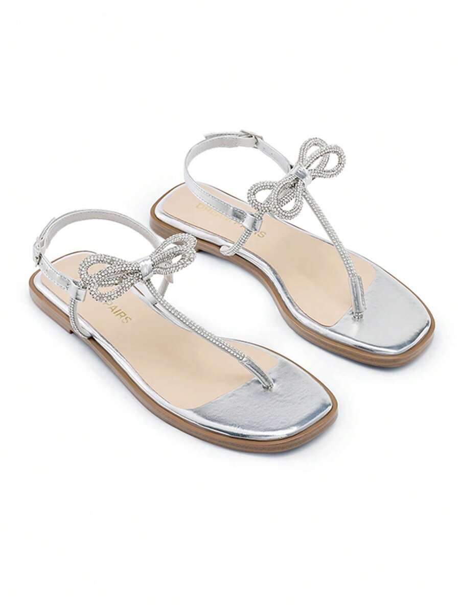 Sandalias planas con tiras para mujer, con punta abierta, lazo, nudo de diamantes de imitación, tiras finas, informales, transpirables, con hebilla ajustable, para verano - Plateado - Ver 1